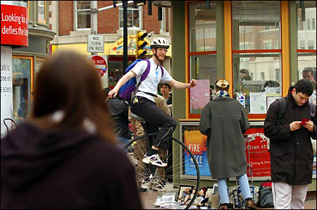 Warren unicycling through the