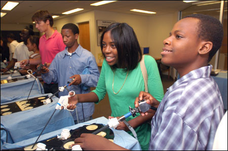 Crimson Academy students practice with surgical