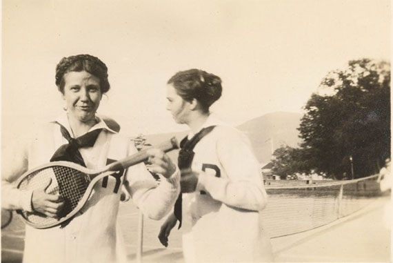 Two Radcliffe College students mug for the camera during a 1914 tennis outing at Silver Bay, Lake George, N.Y. Photo courtesy of Schlesinger Library