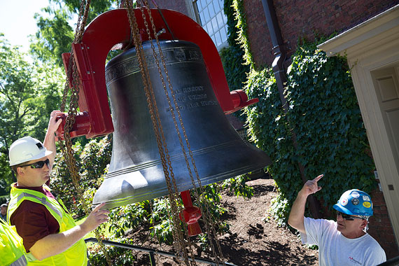 Paul Mason, director at the John Taylor & Co. foundry where both bells were cast, and Ziggy Bialek prepare to install the new bell in the Memorial Church tower. 