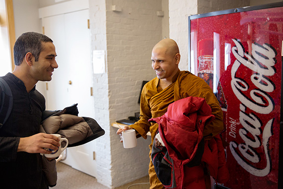 Ishwor Shrestha (left), a Buddhist minister from Nepal, chats with Bhante Kusala, a Buddhist monk from Sri Lanka.