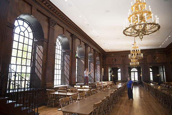 The majestic dining hall was part of the pre-student tour. Russ Porter (left), administrative dean for science, was shown around by Merle Bicknell, assistant dean for FAS physical resources. Kris Snibbe/Harvard Staff Photographer