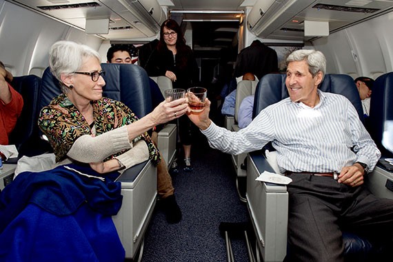 U.S. Department of State Secretary Kerry and Under Secretary Sherman Raise a Toast to Finalizing the Iran Nuclear Agreement as They Flew Home From Vienna Secretary Kerry and Under Secretary of State for Political Affairs Sherman share a toast of madeira wine – the same liquor the Founding Fathers used to toast the Declaration of Independence – as they flew home from Vienna, Austria, on July 14, 2015, after the E.U./P5+1/Iranian nuclear agreement was announced. [State Department photo/ Public Domain]