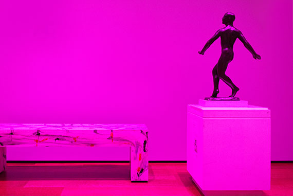 Magenta lighting creates a unique view of Nashat's bench and the Harvard Art Museums' sculpture. Photo by Susan Young © President and Fellows of Harvard College