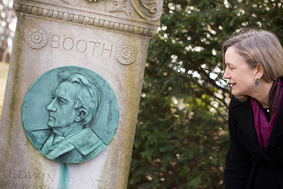 Melissa Banta looks at the monument for Edwin Booth, brother of John Wilkes Booth. 