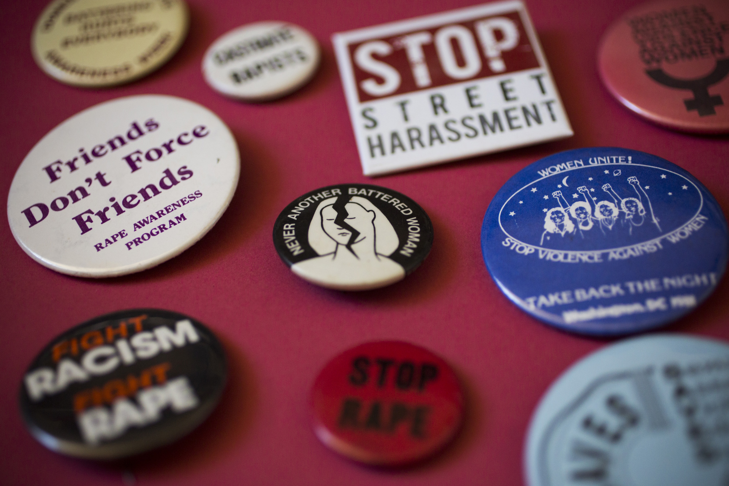 Stop Violence Against Women buttons.
