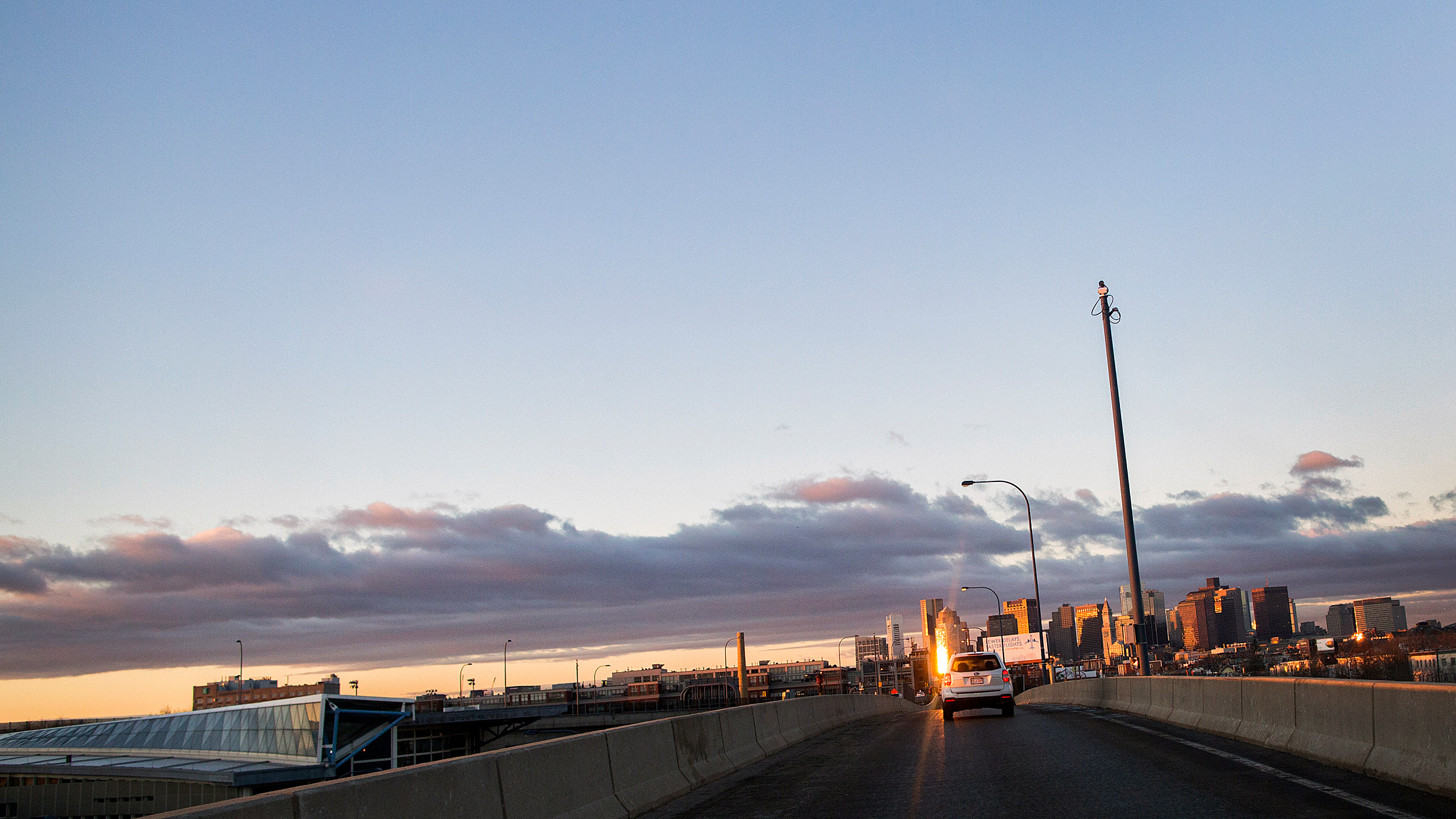 Boston skyline comes into view during morning commute.