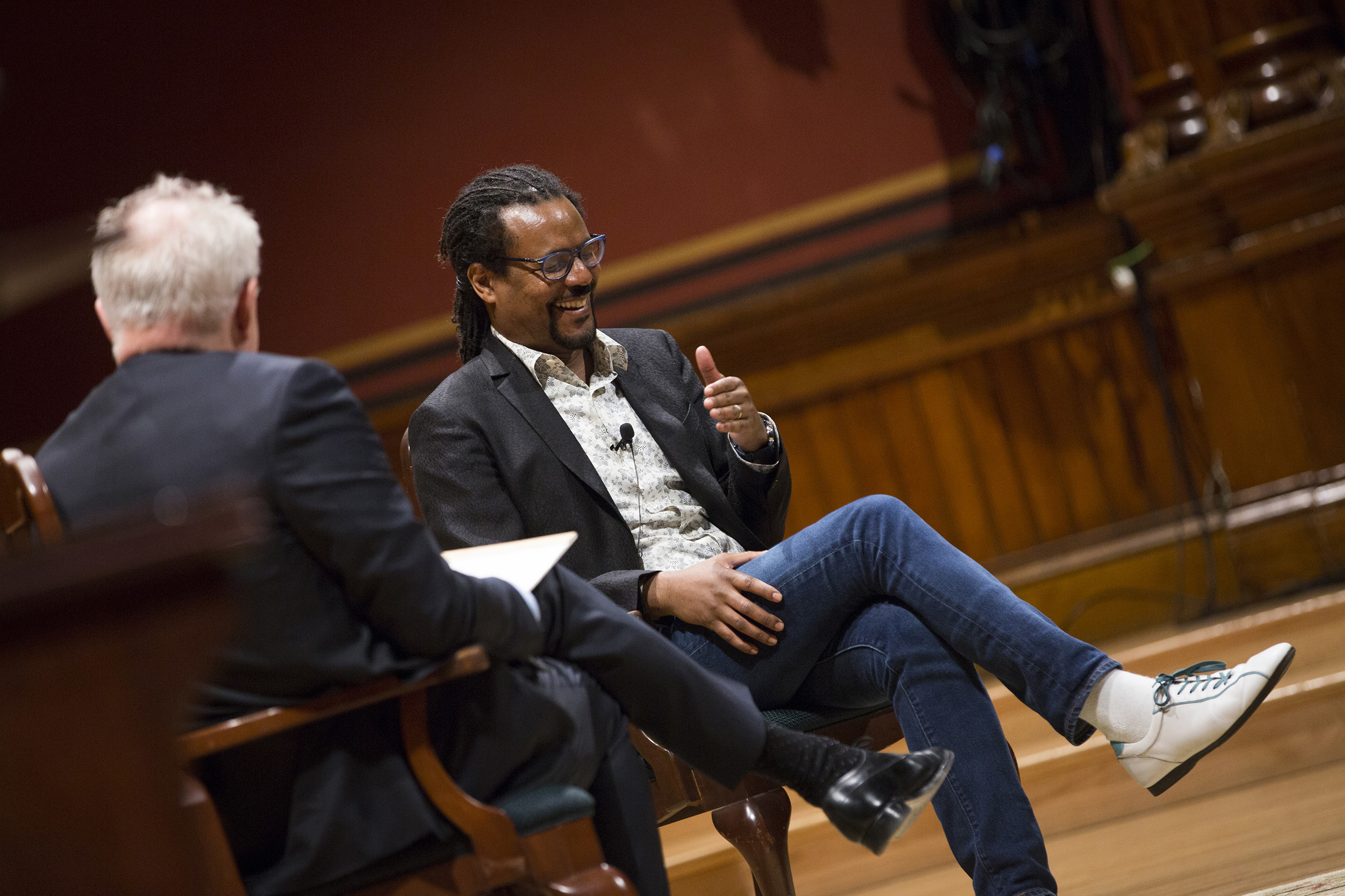 Colson Whitehead laughs with John Lithgow