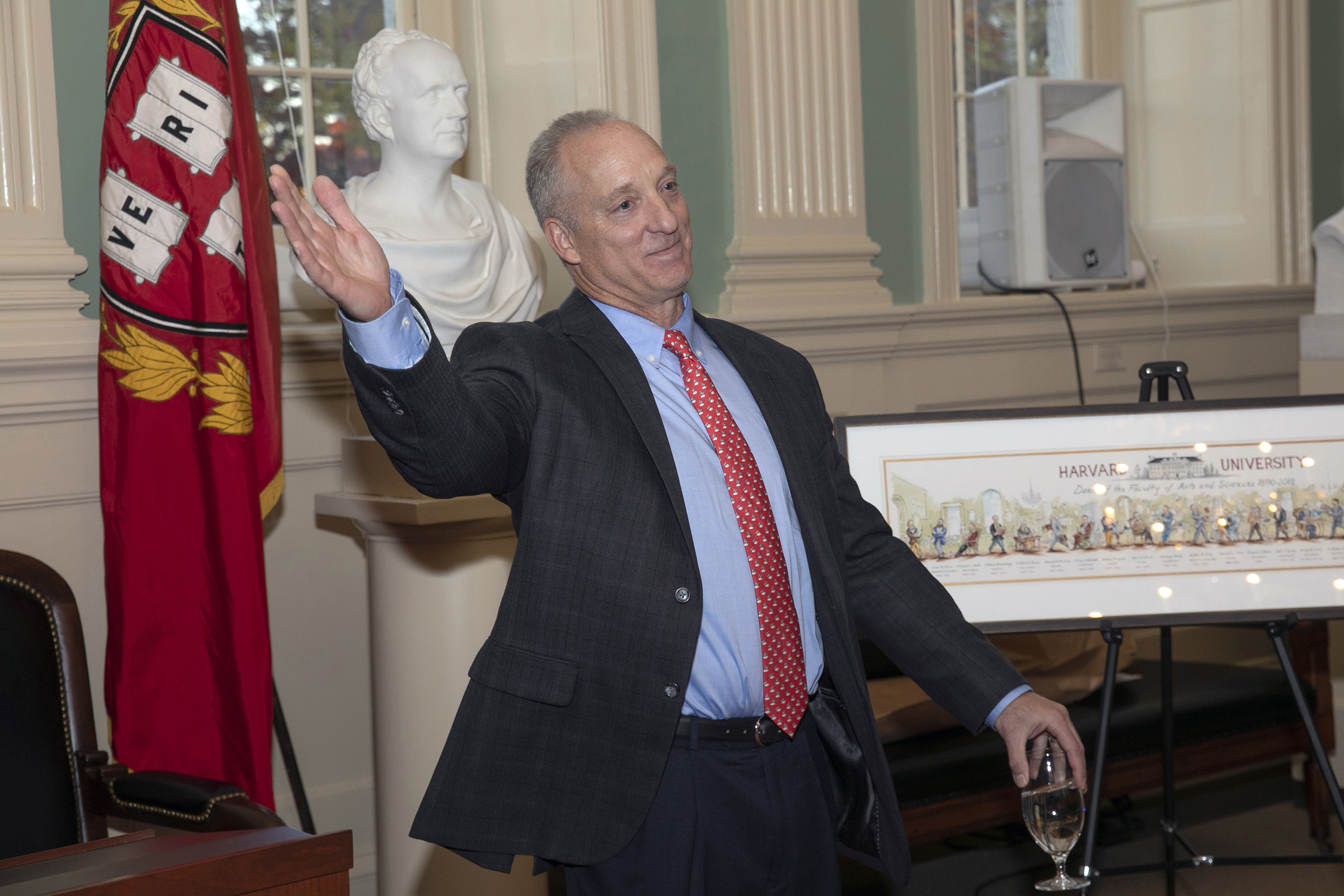 Michael D. Smith waves goodbye at a faculty sendoff.