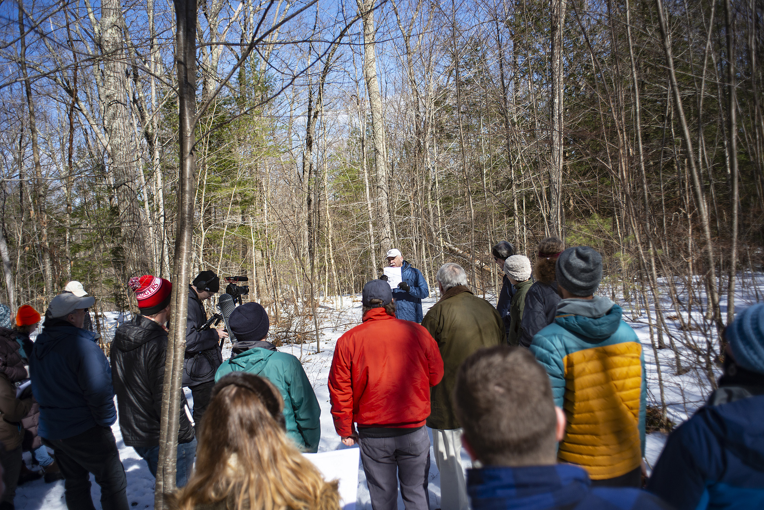 A group tours Harvard Forest.
