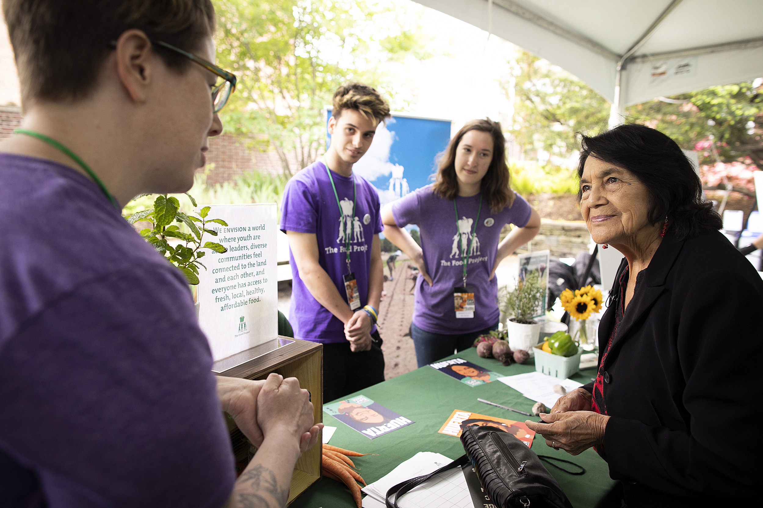 Dolores Huerta chats with members of The Food Project
