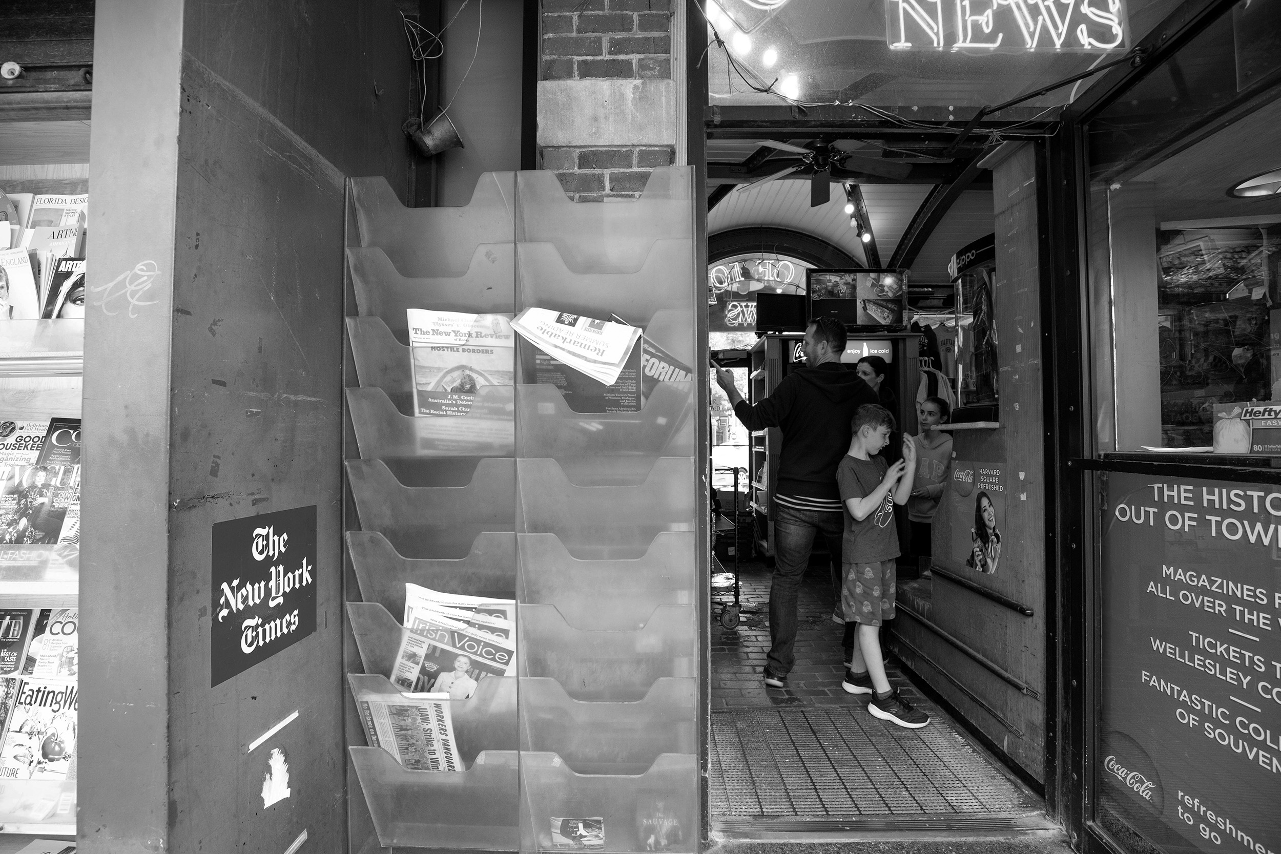 Looking inside the newsstand.