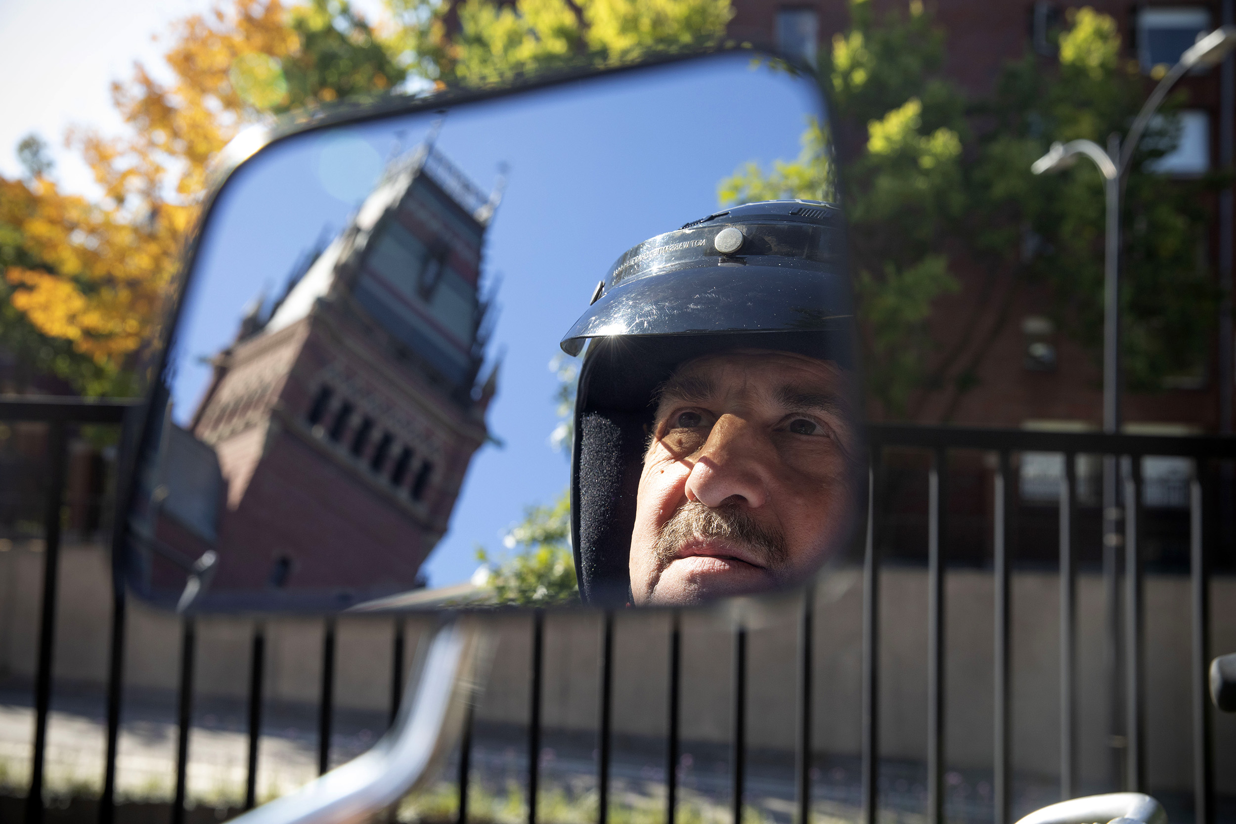David Seley uses an old three-wheel moped to commute to Annenberg Hall, where he works.