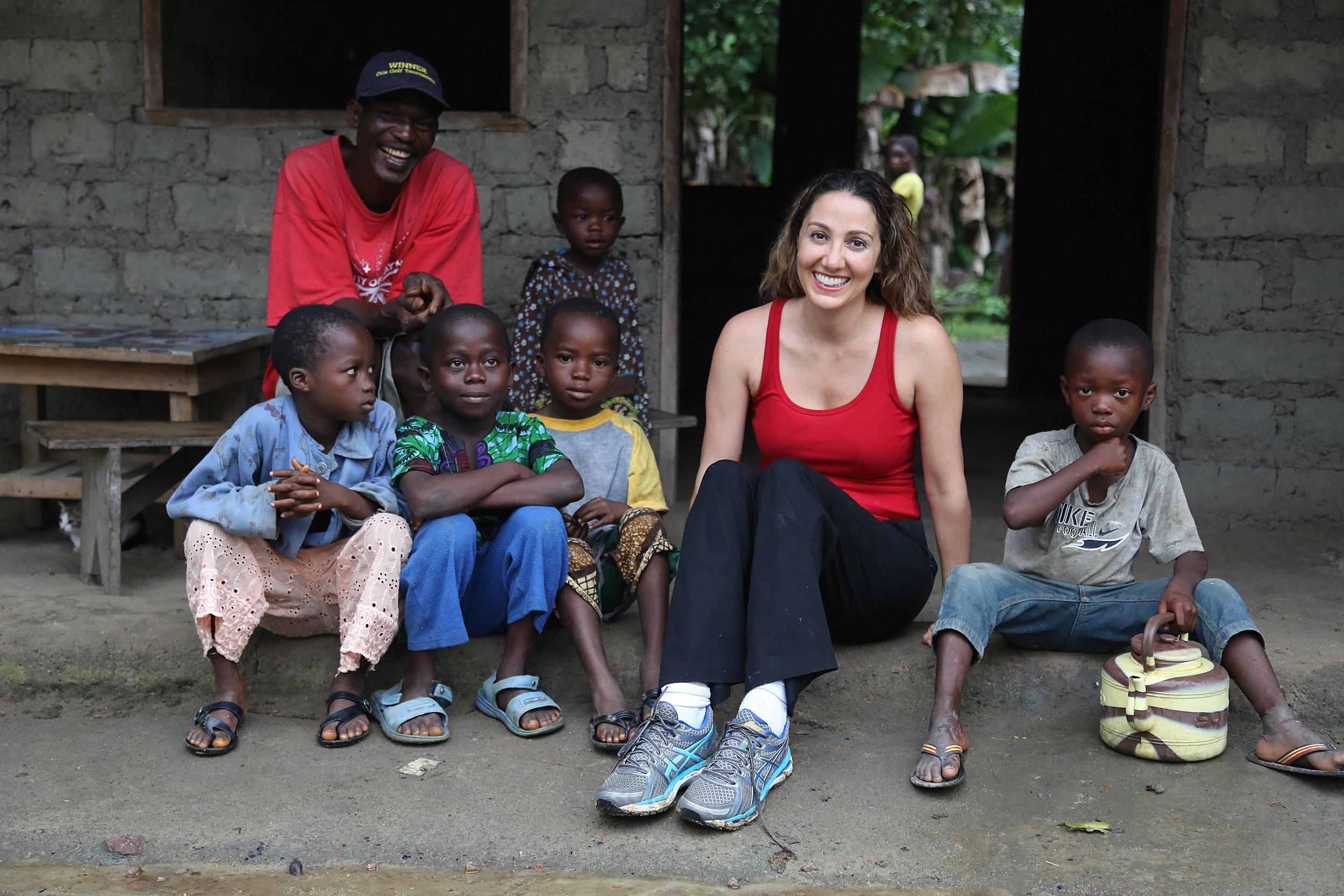Sabeti with children in Sierra Leone.