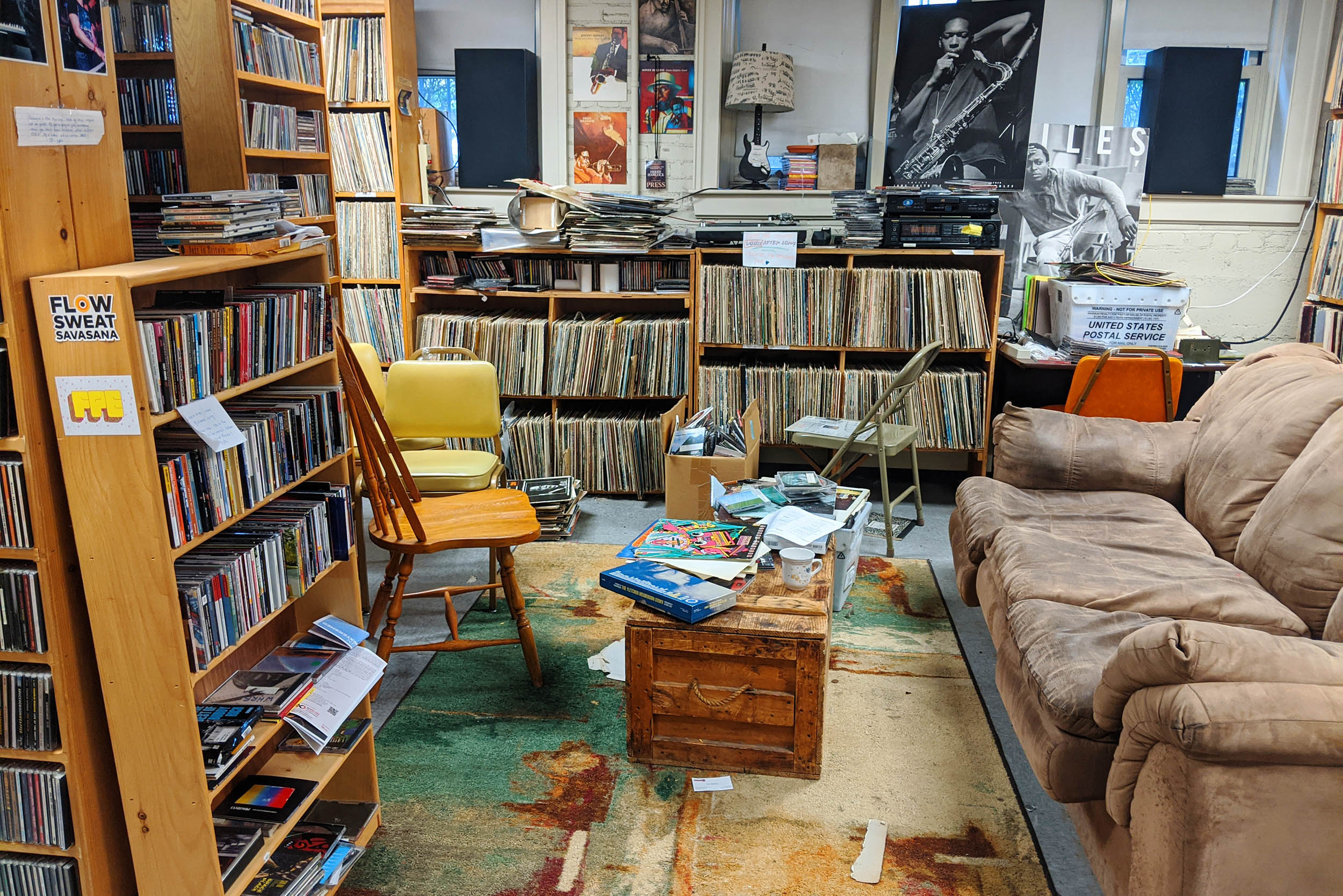 WHRB studios with shelves of albums are pictured.