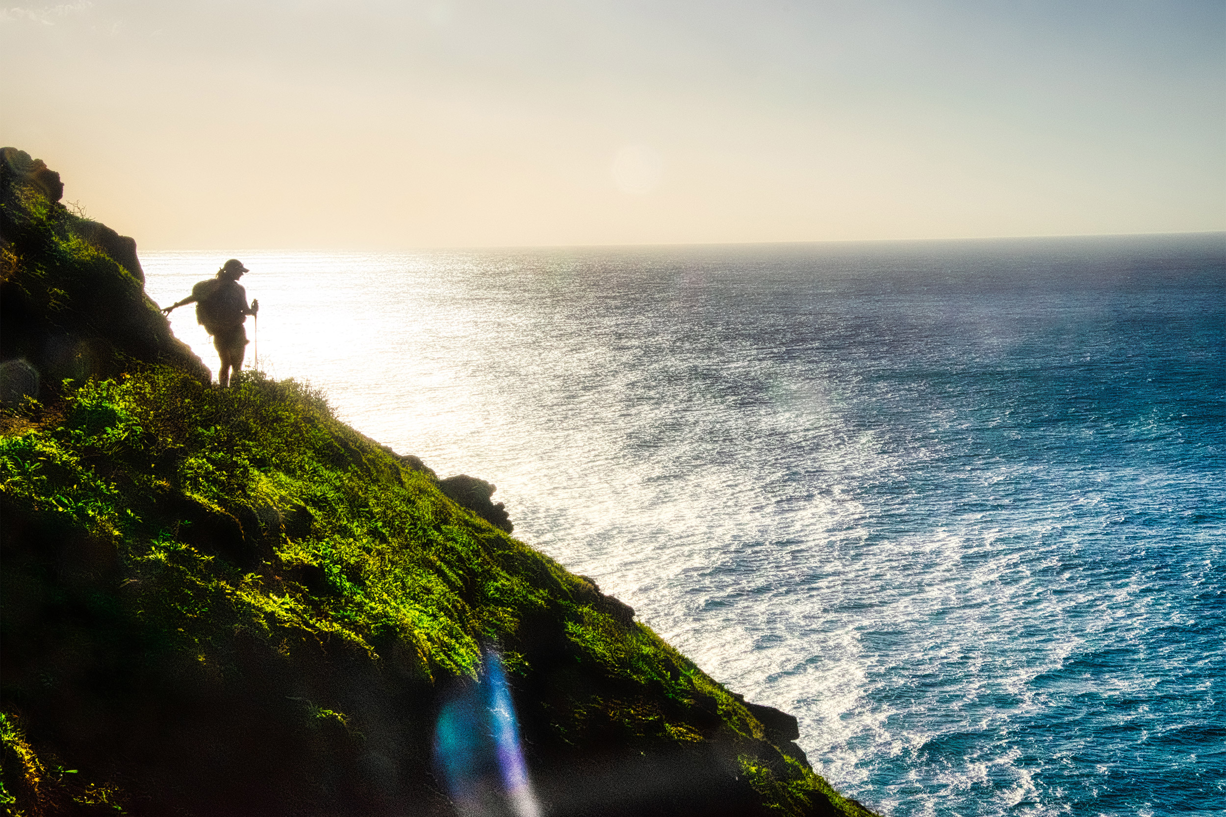 Kirstin Woody Scott on cliff overlooking ocean.