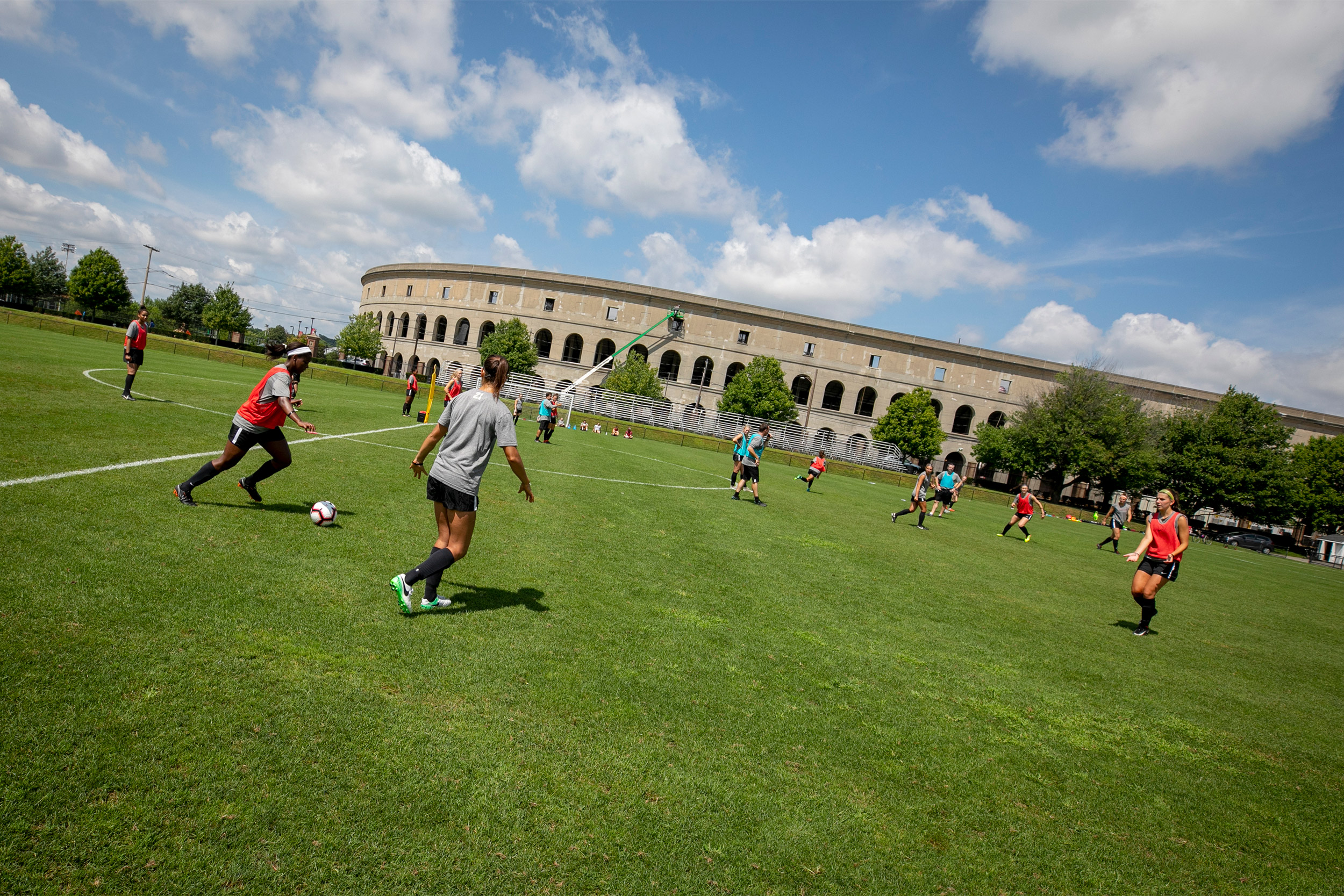 Women playing soccer.