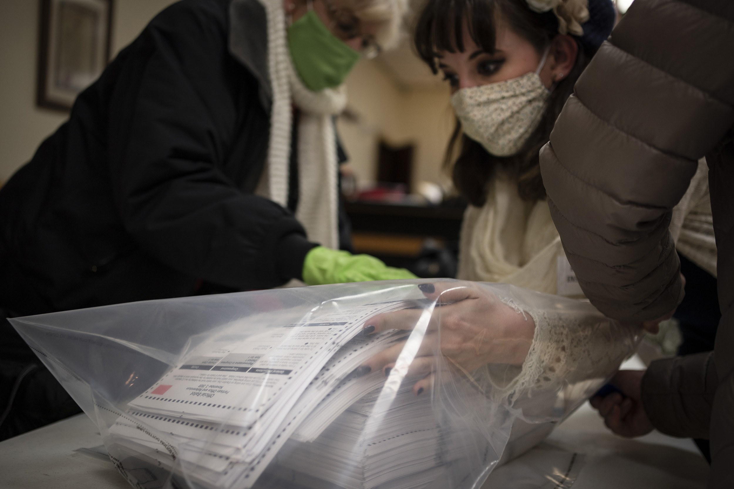 Election staff packing ballots.