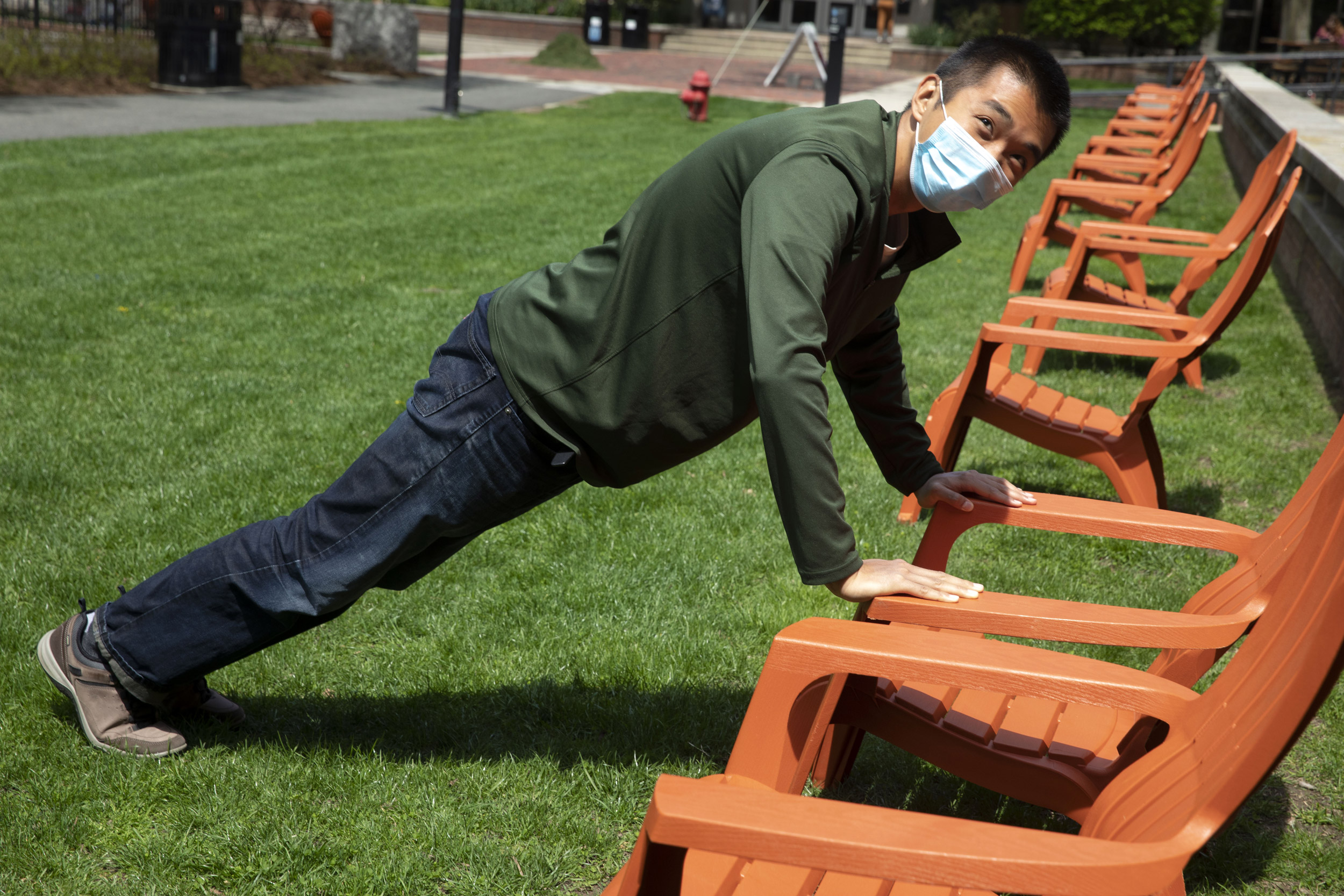 Mike Xie '22, Quincy House resident takes a break for a few push ups at Quincy House.