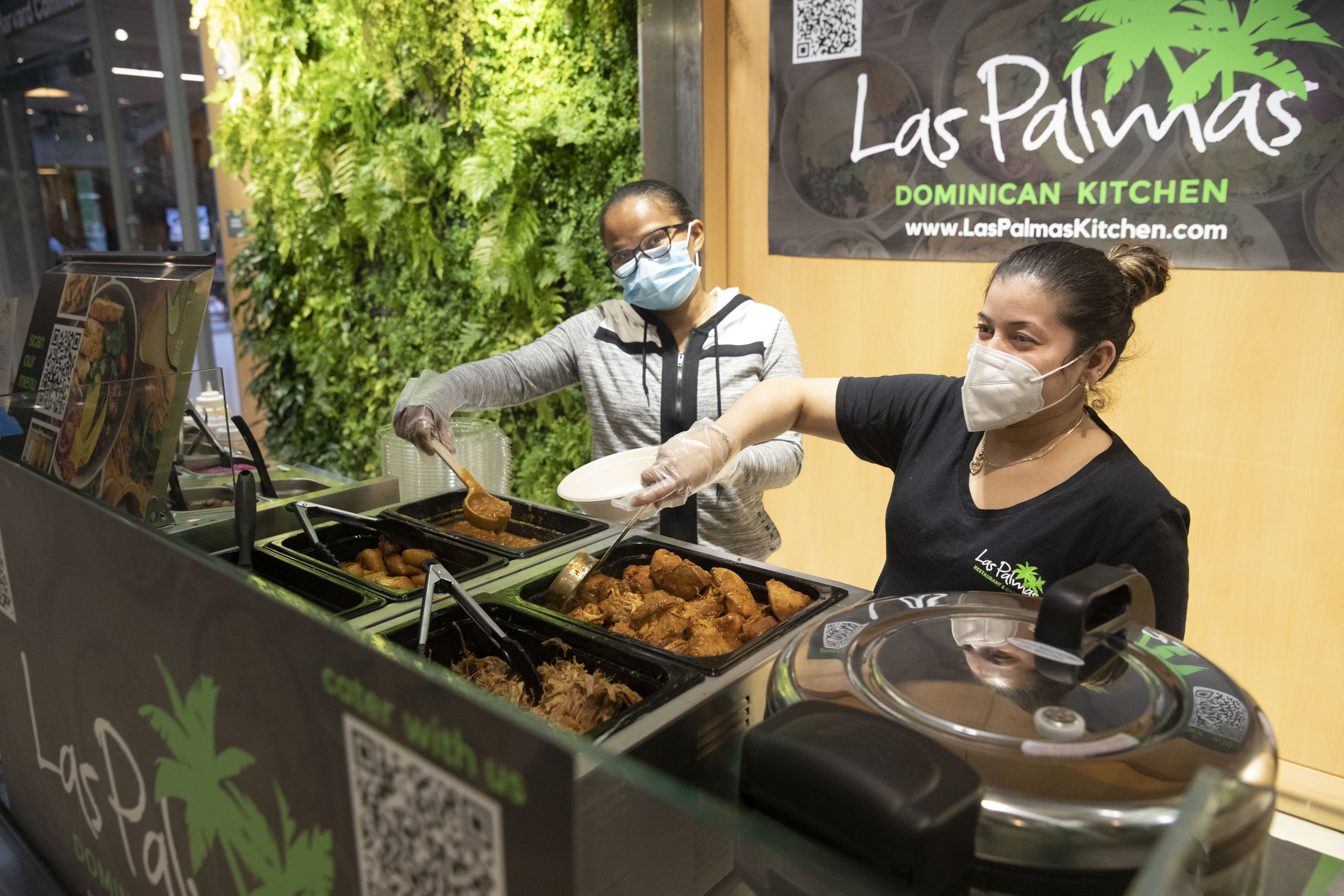 Maritza Hernandez (left) and Delores Martinez showcase Las Palmas’ featured fare