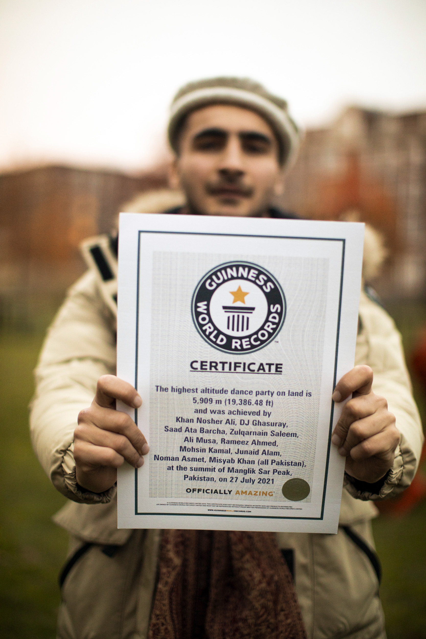 Nosher Ali Khan holds his Guinness record.