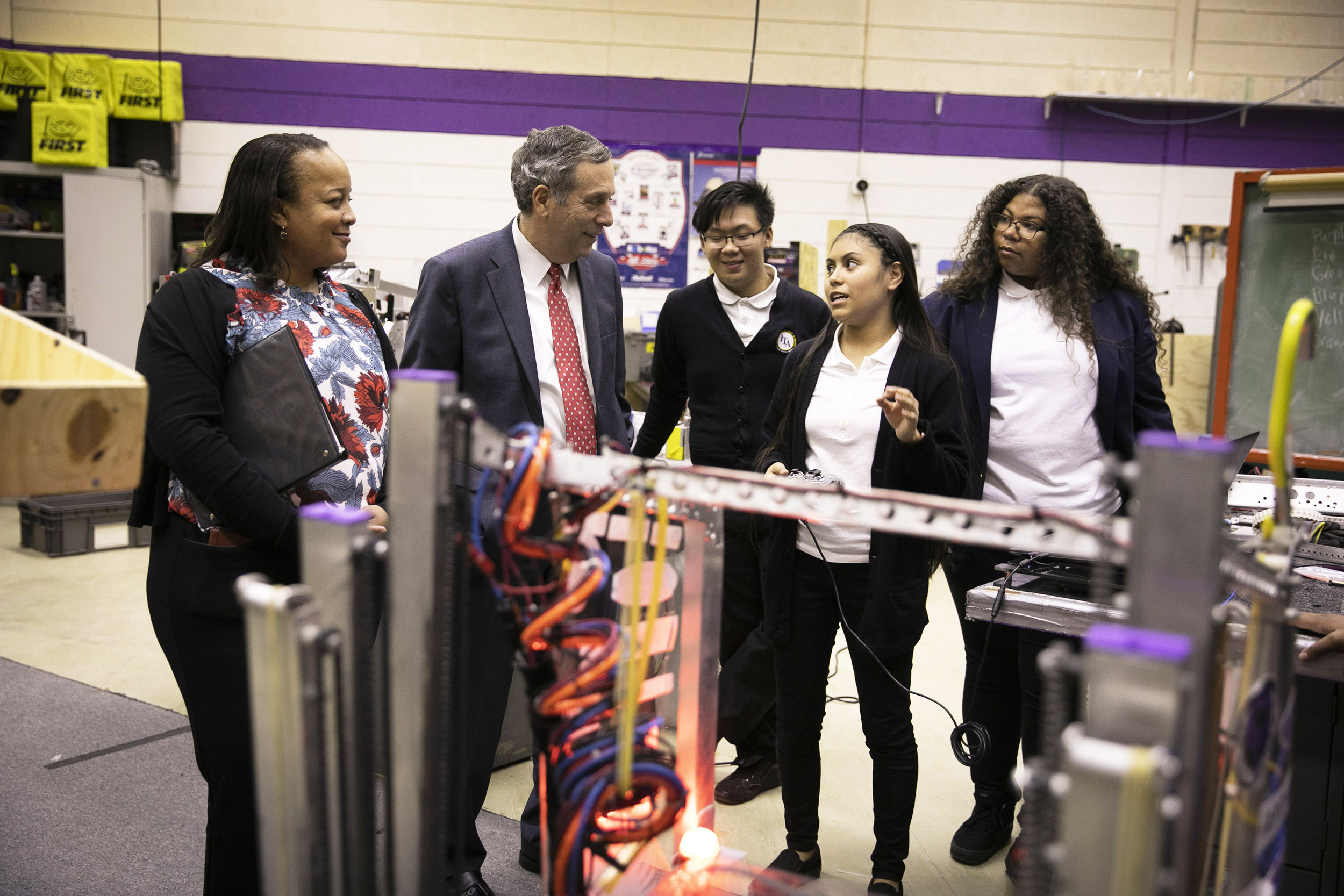 President Larry Bacow and Dean Bridget Terry Long visit the International Technology Academy in Pontiac, Michigan.
