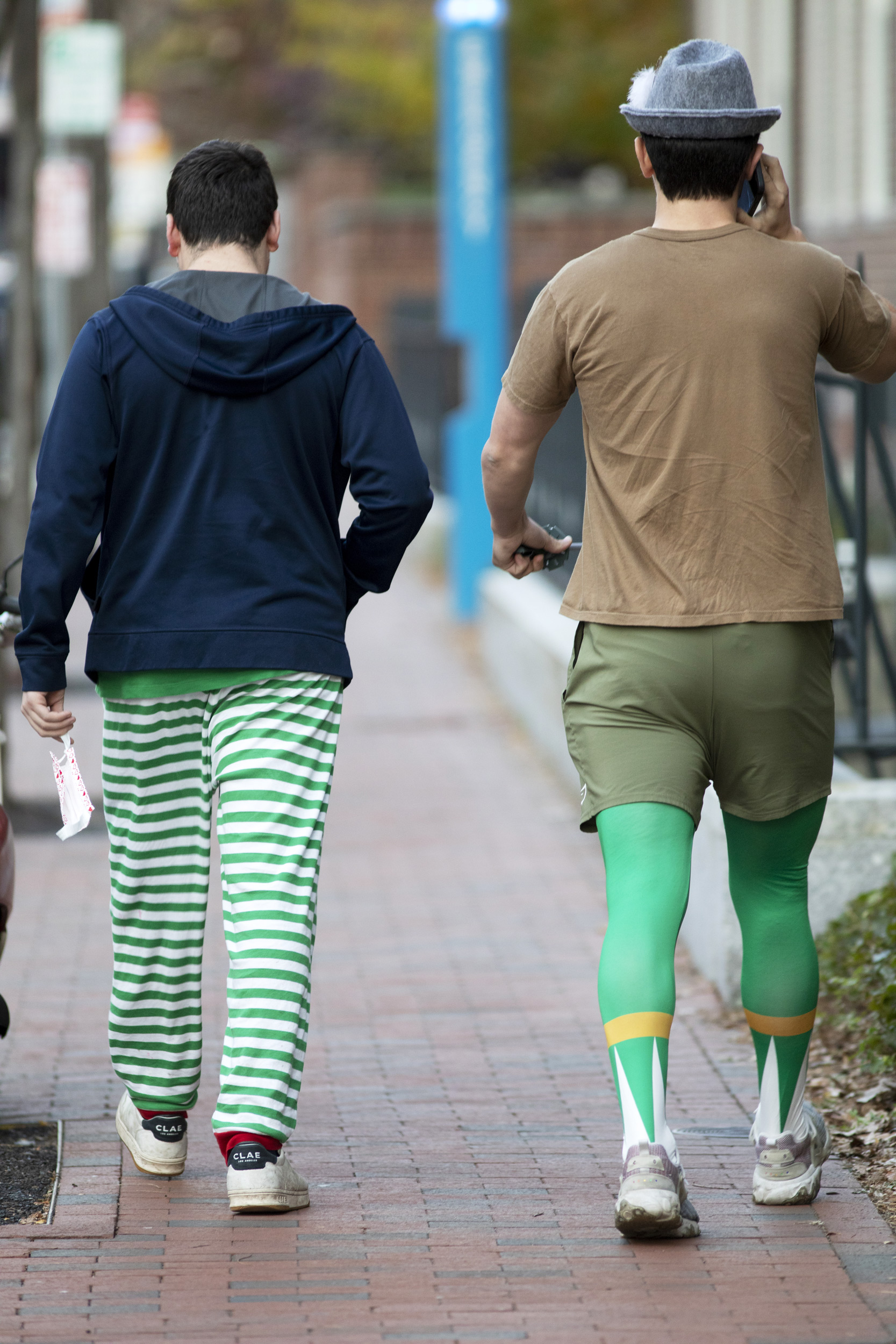 Two men wearing green stockings.