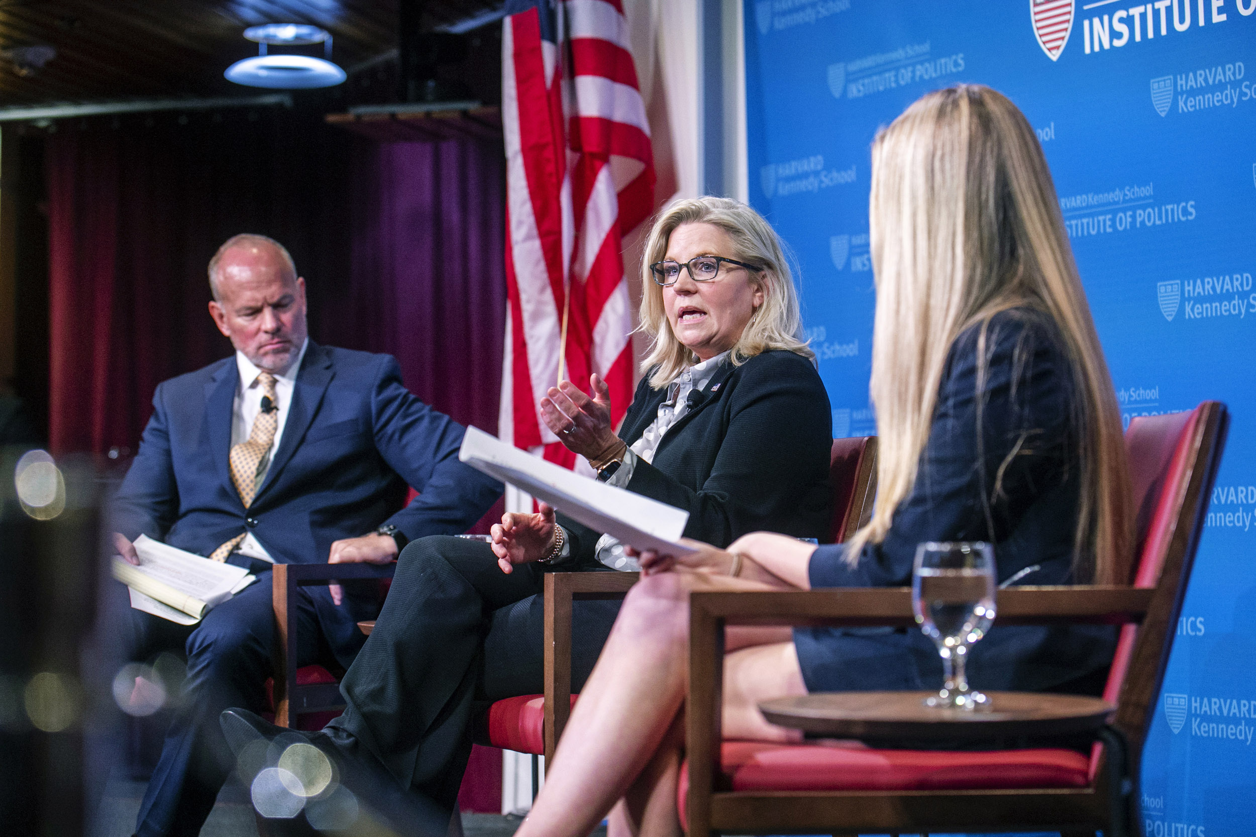 Liz Cheney talking with Matthew Mead and Hannah A. Bottarel.