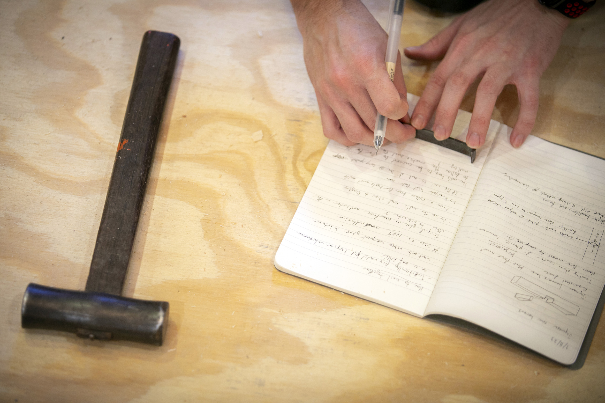 Hensch marks the shape in his journal as a record of the correct form.