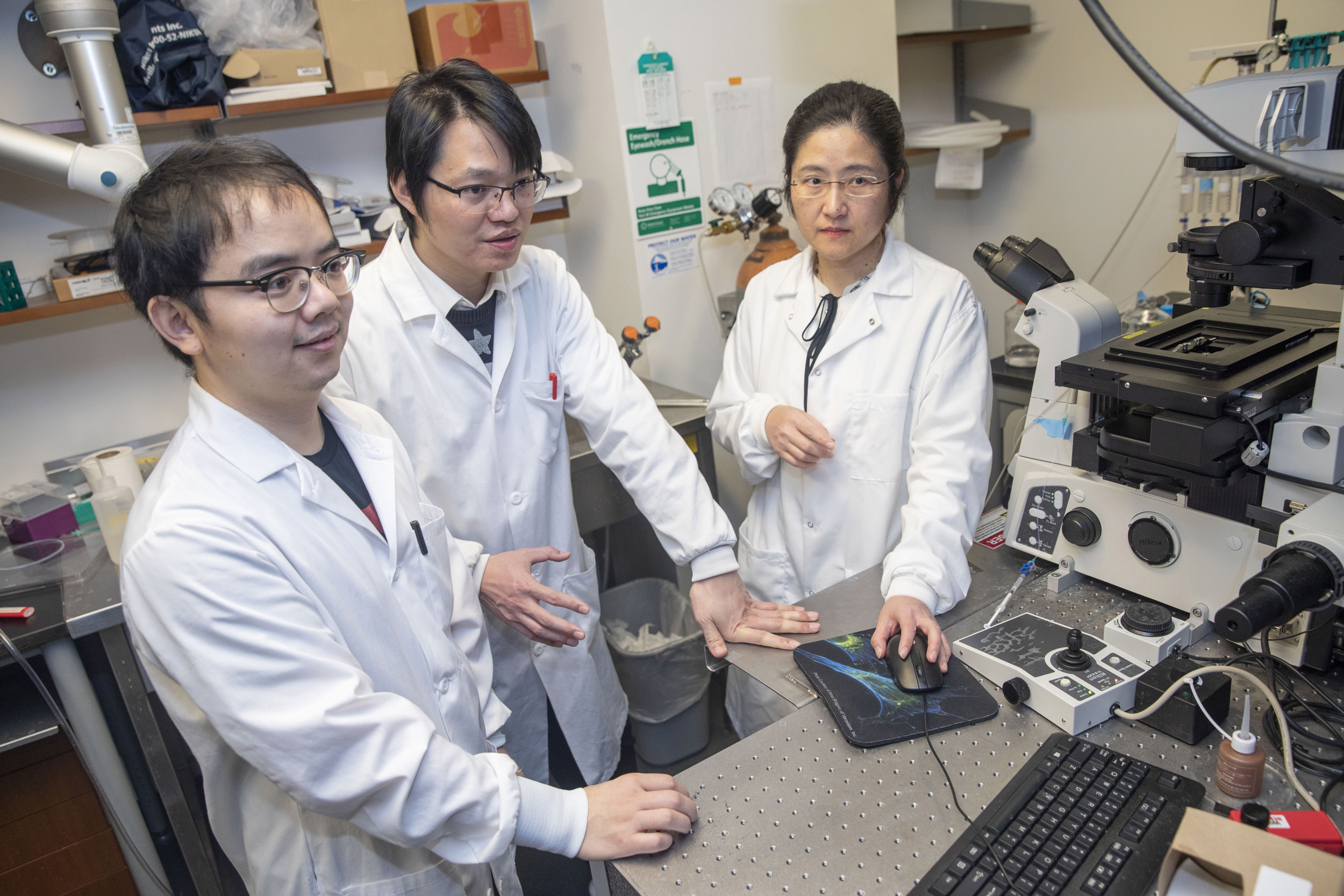 Taihong Wu (from left), Minghai Ge, and Professor Yun Zhang.