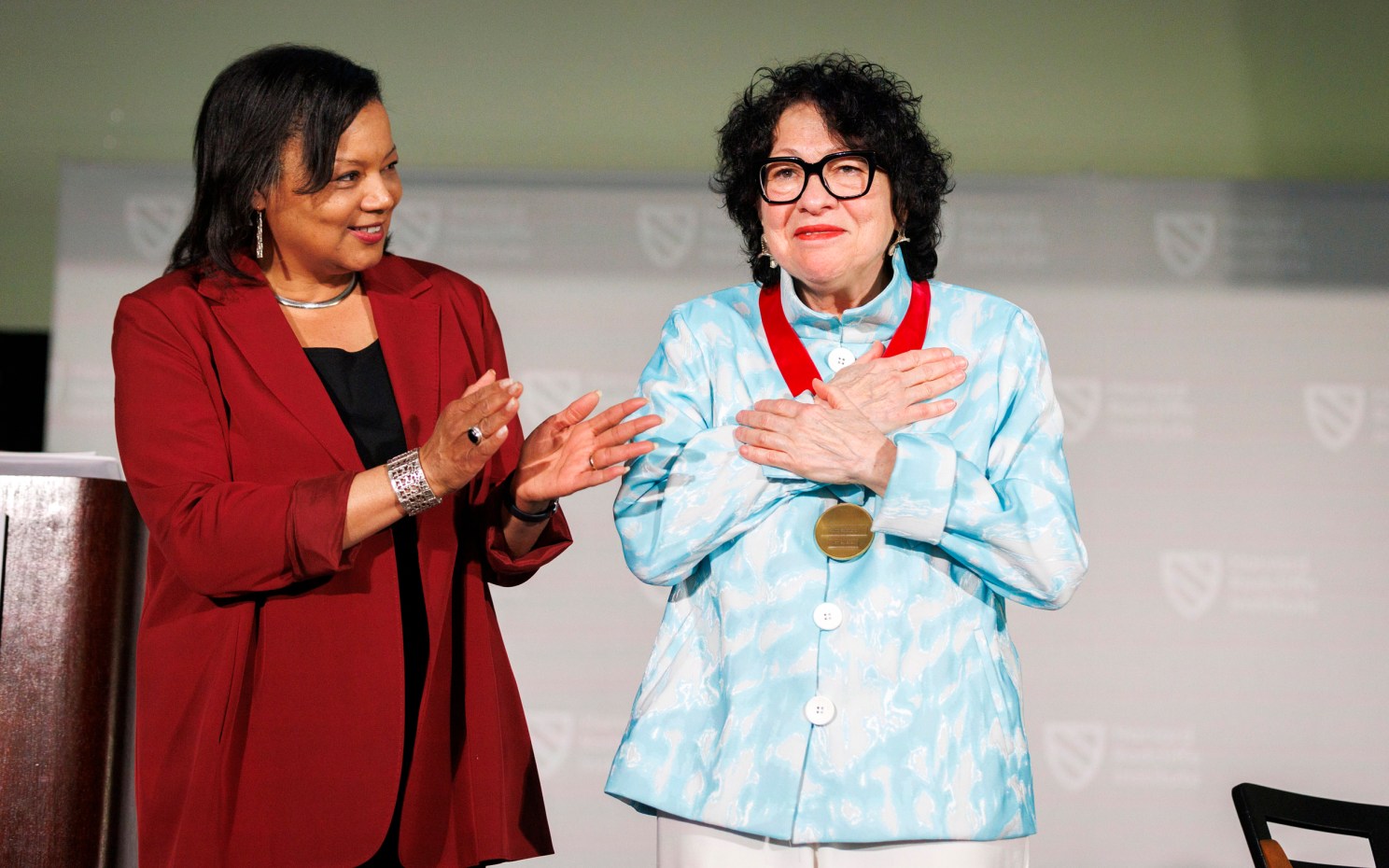 Radcliffe Dean Tomiko Brown-Nagin (left) presents Associate Justice of the U.S .Supreme Court Sonia Sotomayor with the Radcliffe Medal.