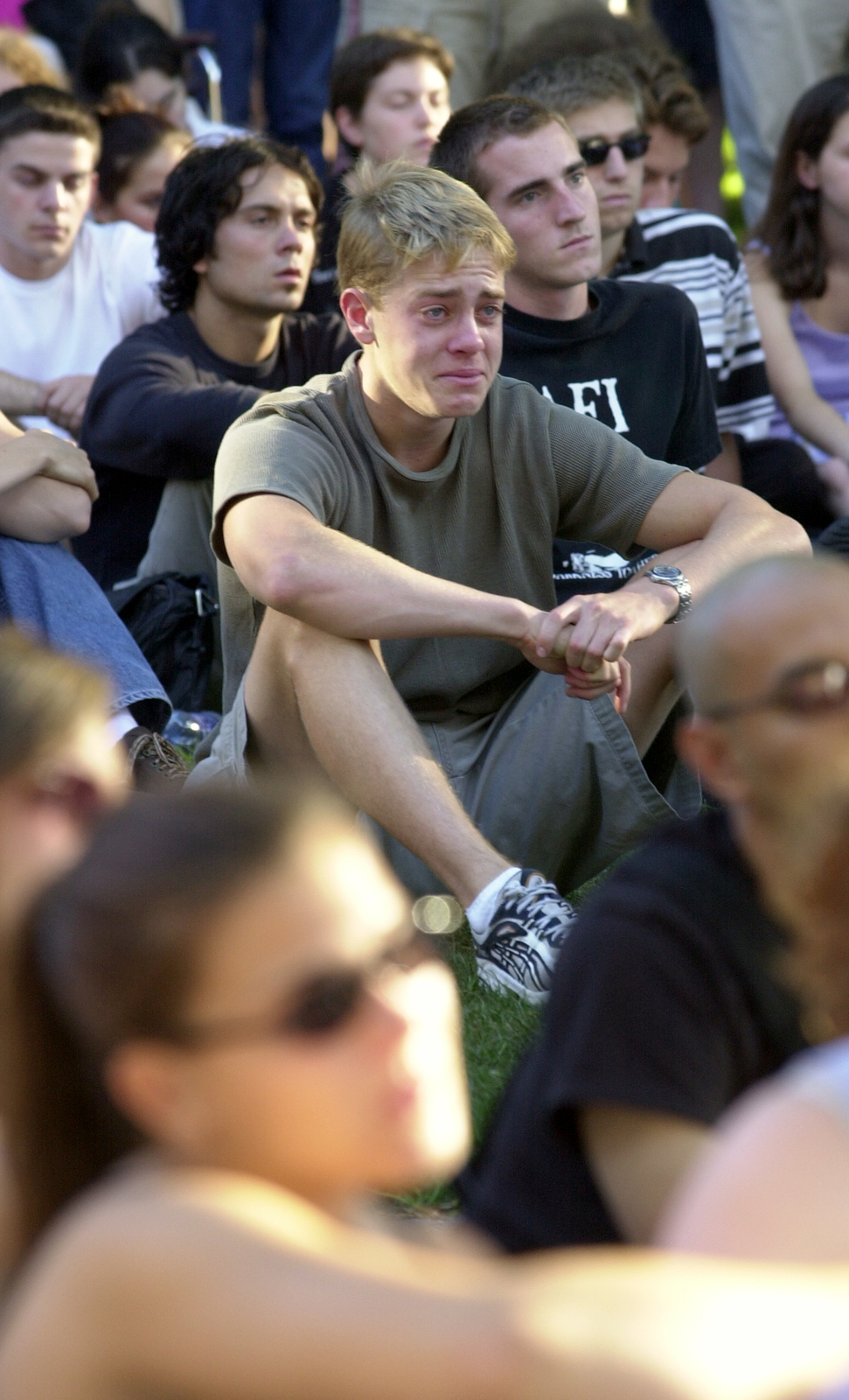 A student crying during the community vigil