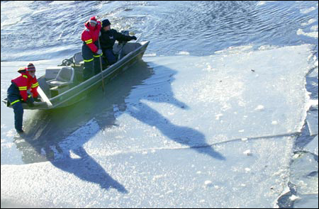 Crew half on the ice, half on