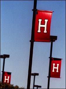 Crimson 'H' banners in the