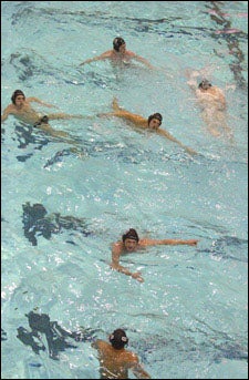 Harvard men's water polo team in the pool
