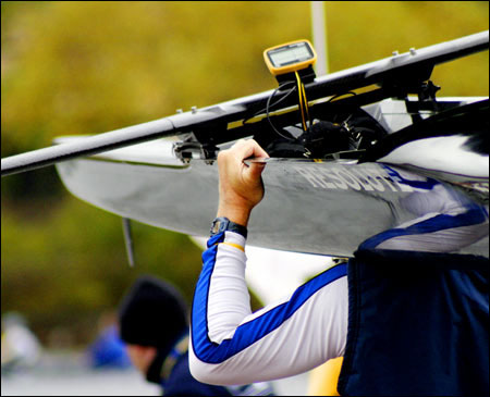 Rower shouldering his