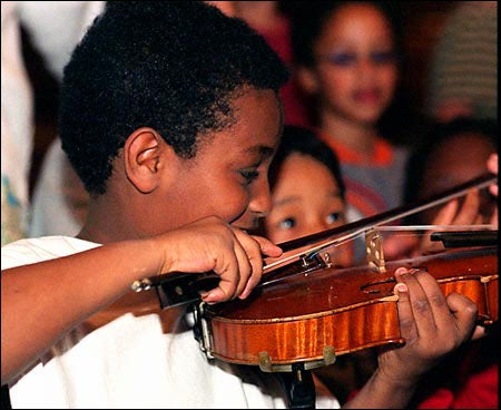 child with violin