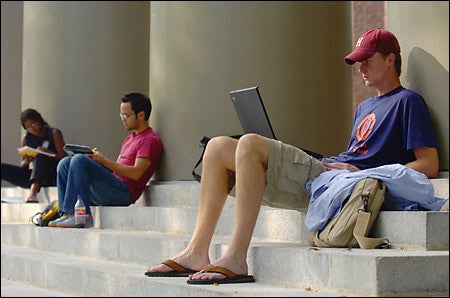 students with laptops