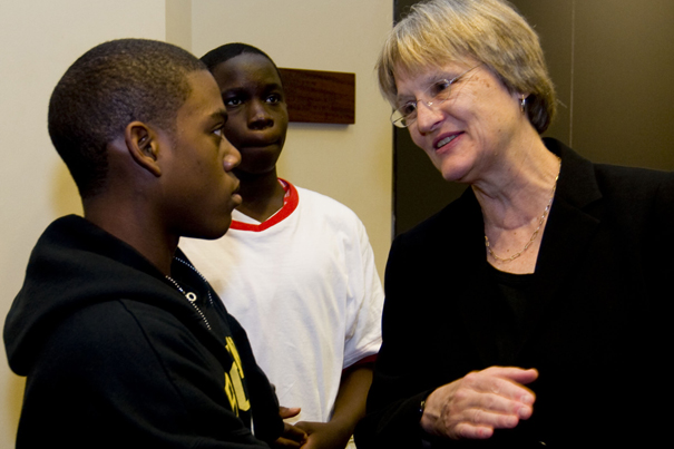 Crimson Summer Academy student Regal Sealy, 15, asks President Drew Faust a question about her research on the Civil War. Sealy said he hopes Faust remembers him when he applies to Harvard in 2012.