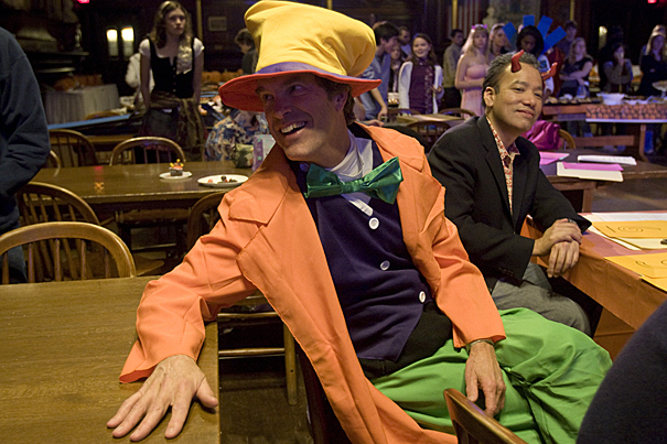 Thomas A. Dingman (left), dean of freshmen and Mad Hatter for the night, enjoys the Catwalk with Robert A. Lue, professor of the practice of molecular and cellular biology and director of Life Sciences Education.