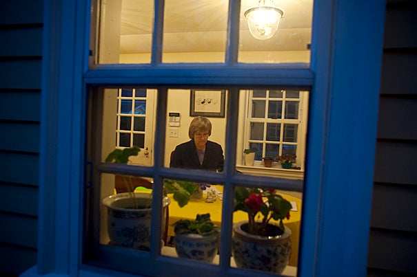 7 a.m. Harvard President Drew Faust edits a speech planned for the Greater Boston Chamber of Commerce while having breakfast at Elmwood, her Cambridge home.

