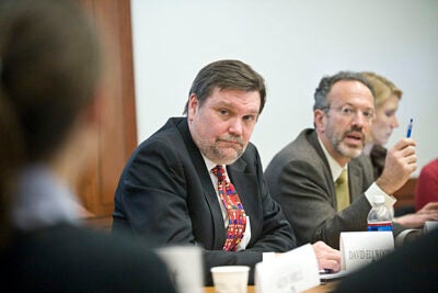 HKS Dean David T. Ellwood (left), co-taught the course with Professor Christopher Stone (right).