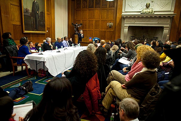 A Harvard symposium, “The Haitian Crisis,” featured five panelists: Jennifer Leaning (at podium), Junot Díaz, Patrick Sylvain, Gregg Greenough, and Marie-Louise Jean-Baptiste. The symposium was Harvard’s first formal, public exploration from a humanities perspective of the Jan. 12 earthquake that claimed many thousands of lives and destroyed much of the capital city.