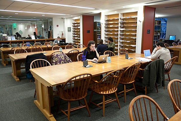 The Fine Arts Library is currently housed in Littauer Hall and is the only Harvard library so far to be LEED-certified. The wood trim is from sustainable forests, the lighting is energy-efficient, and recycled material is in the wallboard, carpets, and even the furniture. Some tables and all study carrels had to be refinished or fitted with power sources, like the tables in the main reading room (above).