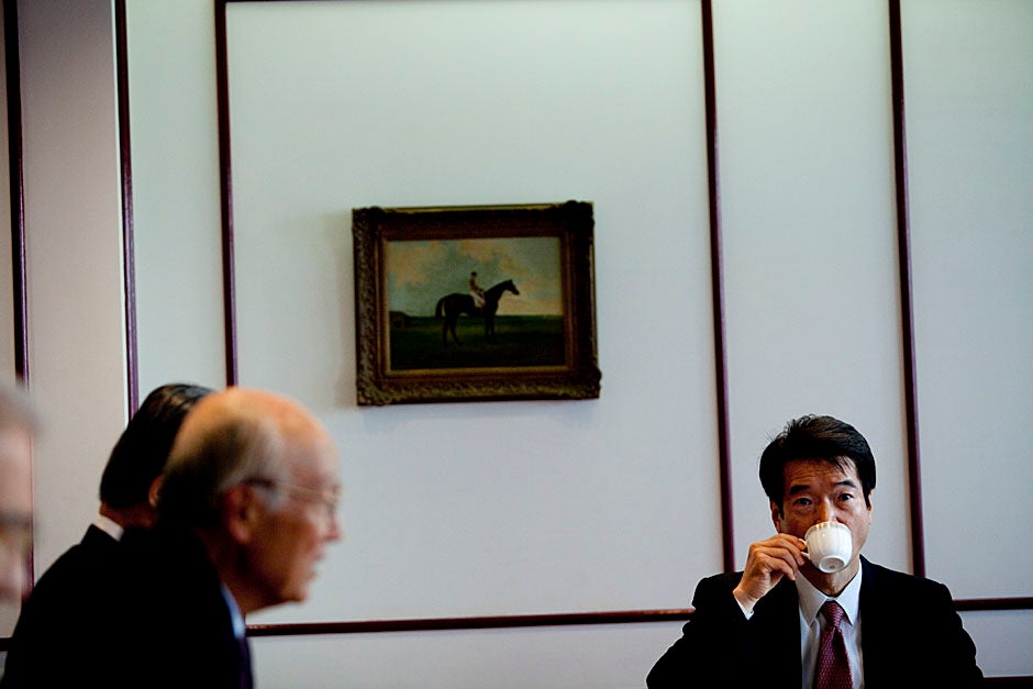 Norio Okaido (right) attends the meeting in the Hotel Okura where Faust meets with CULCON.   
Stephanie Mitchell/Harvard Staff Photographer