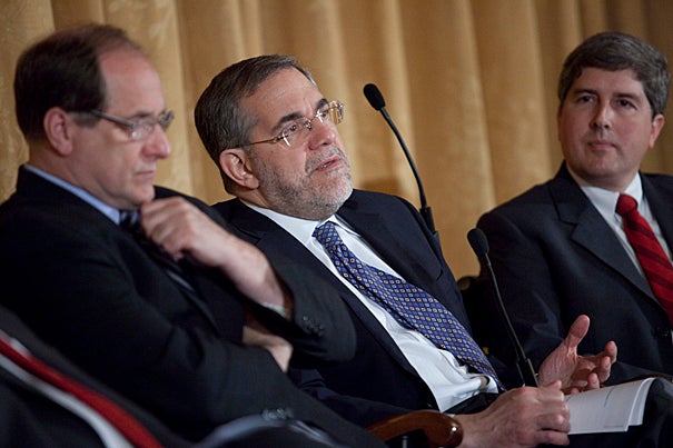 U.S. Rep. Michael Capuano (from left), Harvard Provost Steven Hyman, and Novartis senior director Phil Dormitzer shared the stage as panelists at a global health policy forum. Hyman noted that New England is well placed to play a key role in global health, with collaborations already established among universities, hospitals, and businesses.