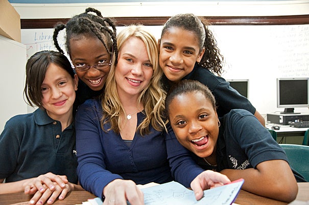 Kim Snodgrass: “I used my education as my savior. It was like my thing that I could always go back to, no matter what happened in my life.” Snodgrass is pictured with students she teaches at the Prospect Hill Academy in Somerville, Mass.