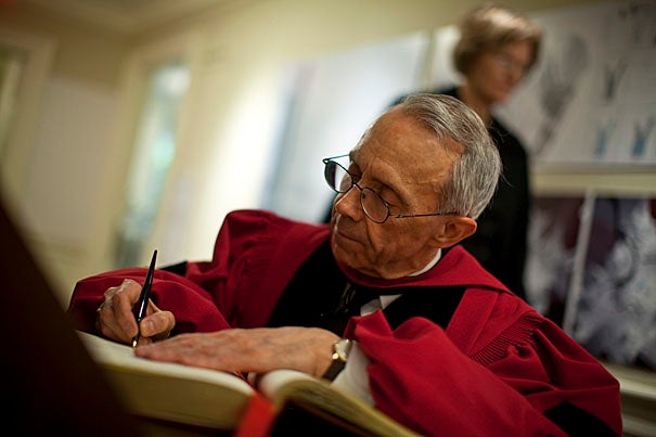  Justice David H. Souter signs the guest book inside Massachusetts Hall prior to the Morning Exercises at Harvard's 359th Commencement.