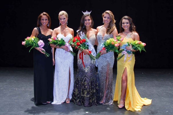 Loren Galler Rabinowitz ’10 (center), a former English concentrator just a month out of Harvard, has been crowned Miss Massachusetts. 