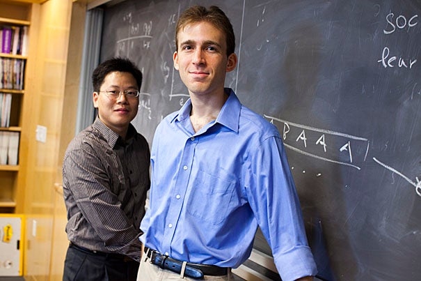 Researchers Feng Fu (left) and Daniel Rosenbloom found that even small changes in the perceived costs or risks of vaccination  can affect public immunization efforts.